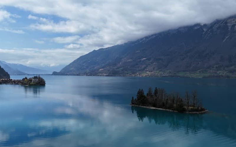 Forest lakeside path near Iseltwald on Lake Brienz