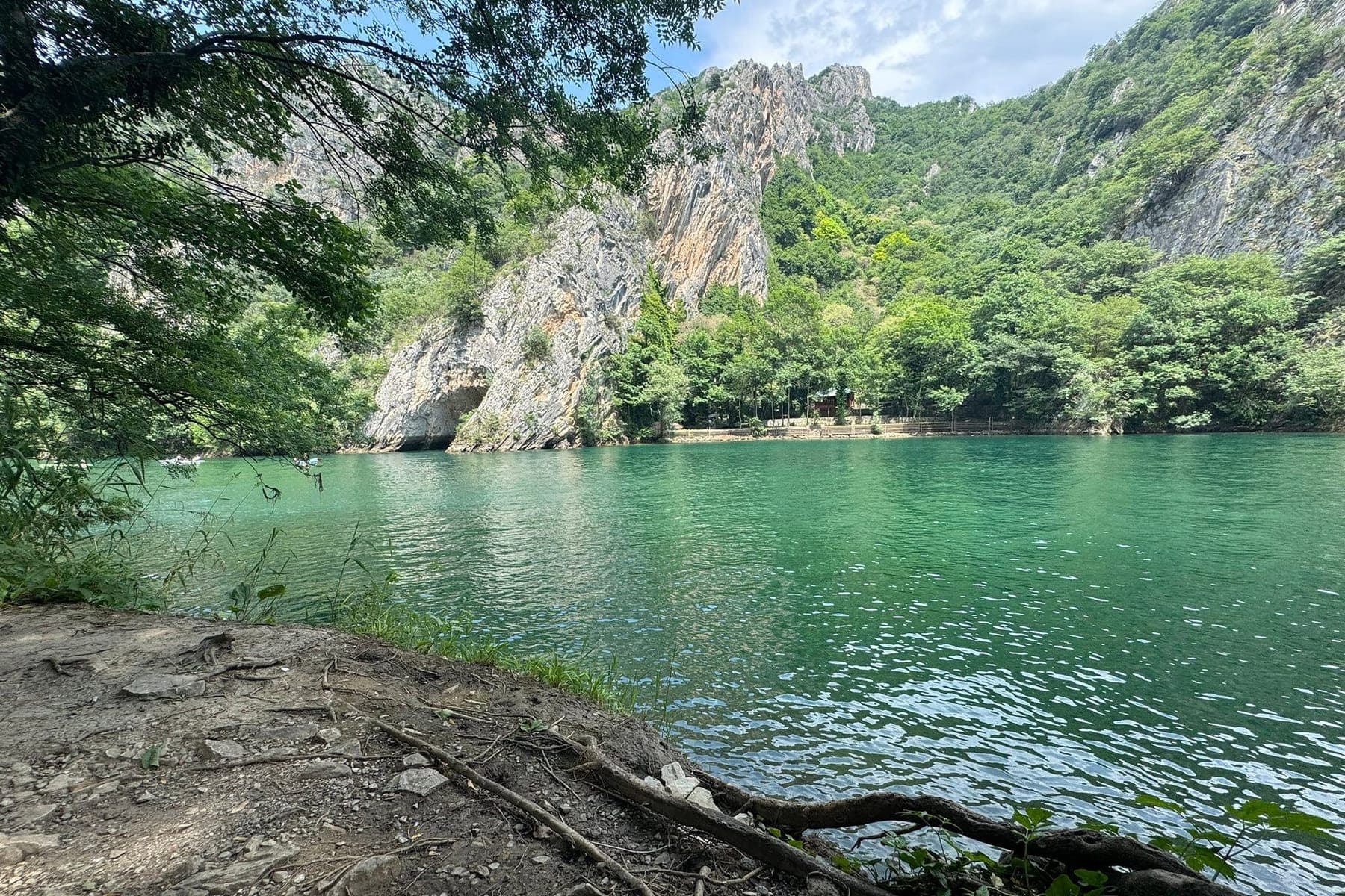 Turquoise water and limestone cliffs in Matka Canyon