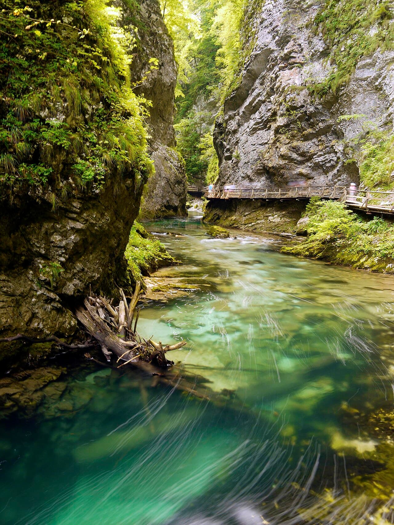 Wooden walkway over turquoise water in Vintgar Gorge, Slovenia